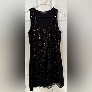 Nicola Bertti Elegant Black Sequin mini dress.
